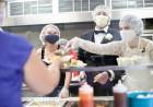 Couple donates wedding day food to shelter, spends day serving the homeless