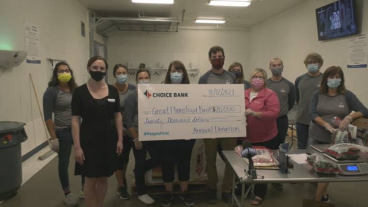 Choice Bank makes donation to Great Plains Food Bank to help curb hunger